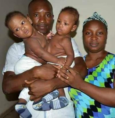 Nigerian parents with conjoined twins